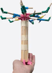 A chopstick tree balanced on a hand