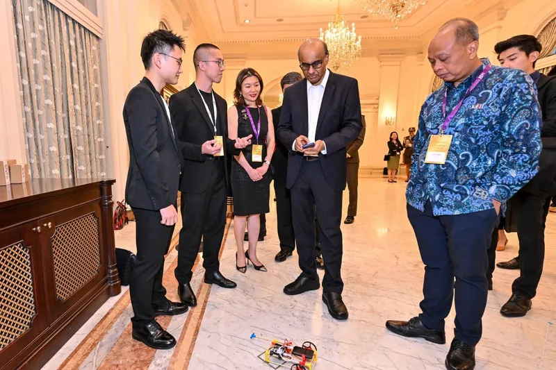 President Tharman Shanmugaratnam driving a Stick ’Em robot car