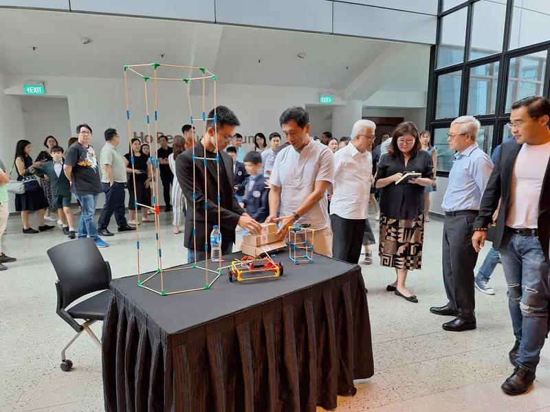 Showing Stick ’Em to Minister Ong Ye Kung