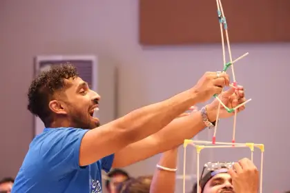 A proud builder and his tower