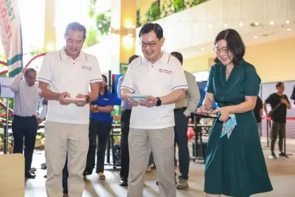 DPM Heng Swee Keat drives a robot car
