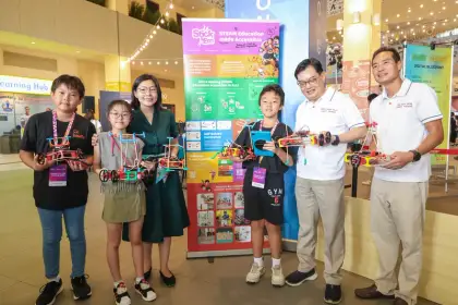 Ministers and kids with their cars