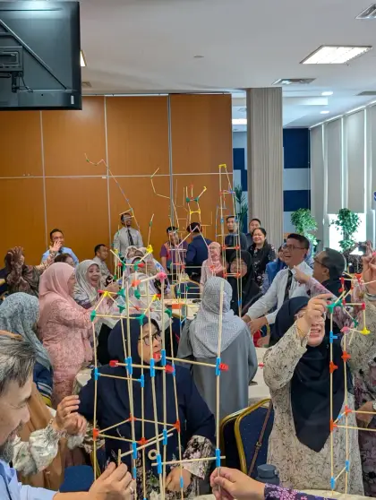 Teachers in Brunei raise a tower