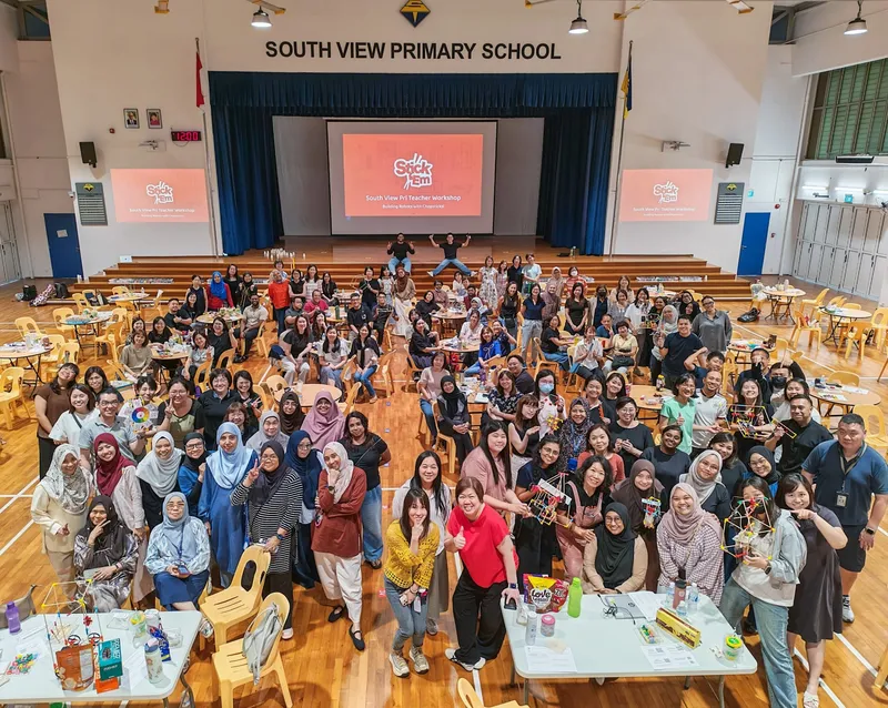 The South View Primary School staff in the school hall with their builds